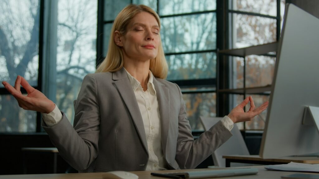 Calm Caucasian middle-aged adult woman mindfulness mature business female relaxed lady businesswoman